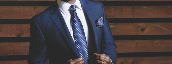A Journey of Style: Blue Socks Man wearing smart blue suit