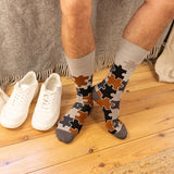 men wearing grey jigsaw socks at home white trainers