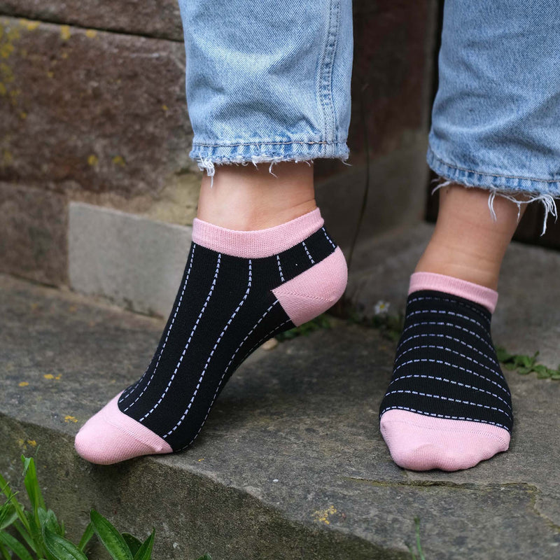 Women wearing Peper Harow black Dash women's luxury trainer socks outdoors