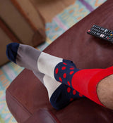 Man wearing scarlet Mayfair luxury socks by Peper Harow 
