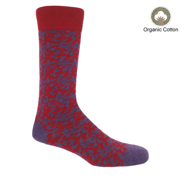 Maelstrom red men's luxury socks by Peper Harow, featuring a quirky purple pattern and purple toe and heel.