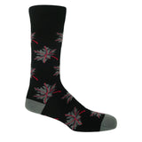 A grey and red maple leaf on coal black socks