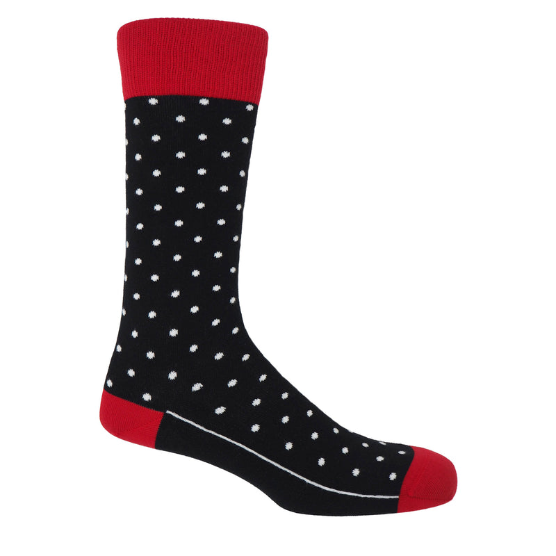 Black pin polka men's socks with white polka dots and a red heel, toe and cuff