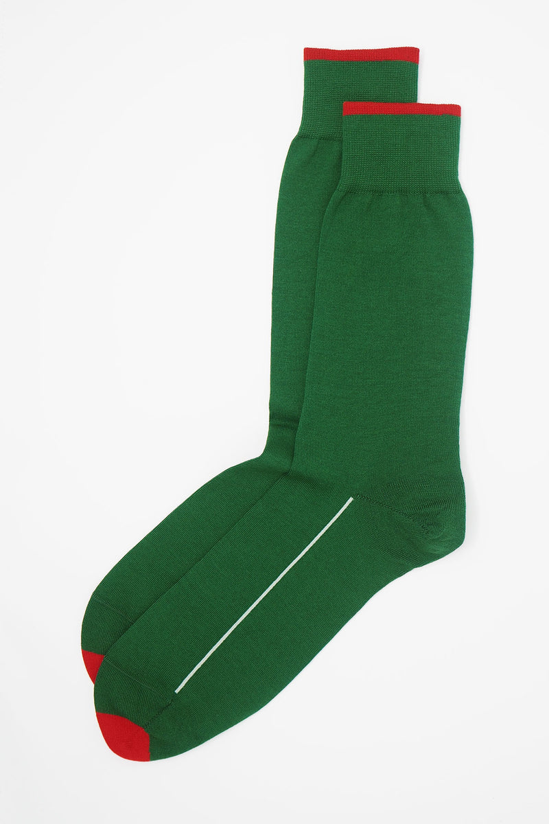 A pair of emerald green square mile men's socks with a red toe and cuff line, and a white line down the side of the foot