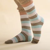 Women wearing Peper Harow turquoise Chord women's luxury socks