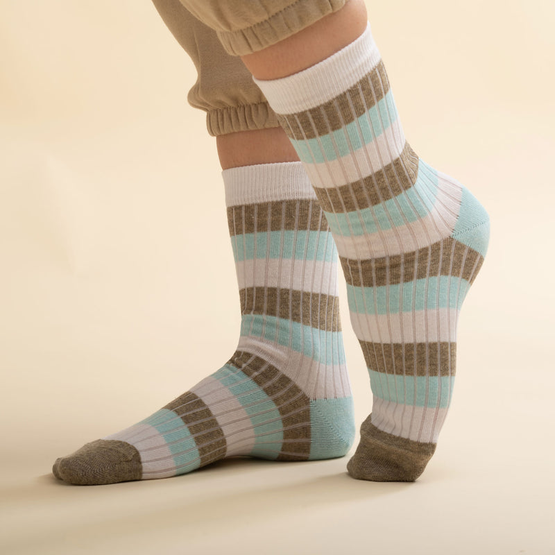 Women wearing Peper Harow turquoise Chord women's luxury socks