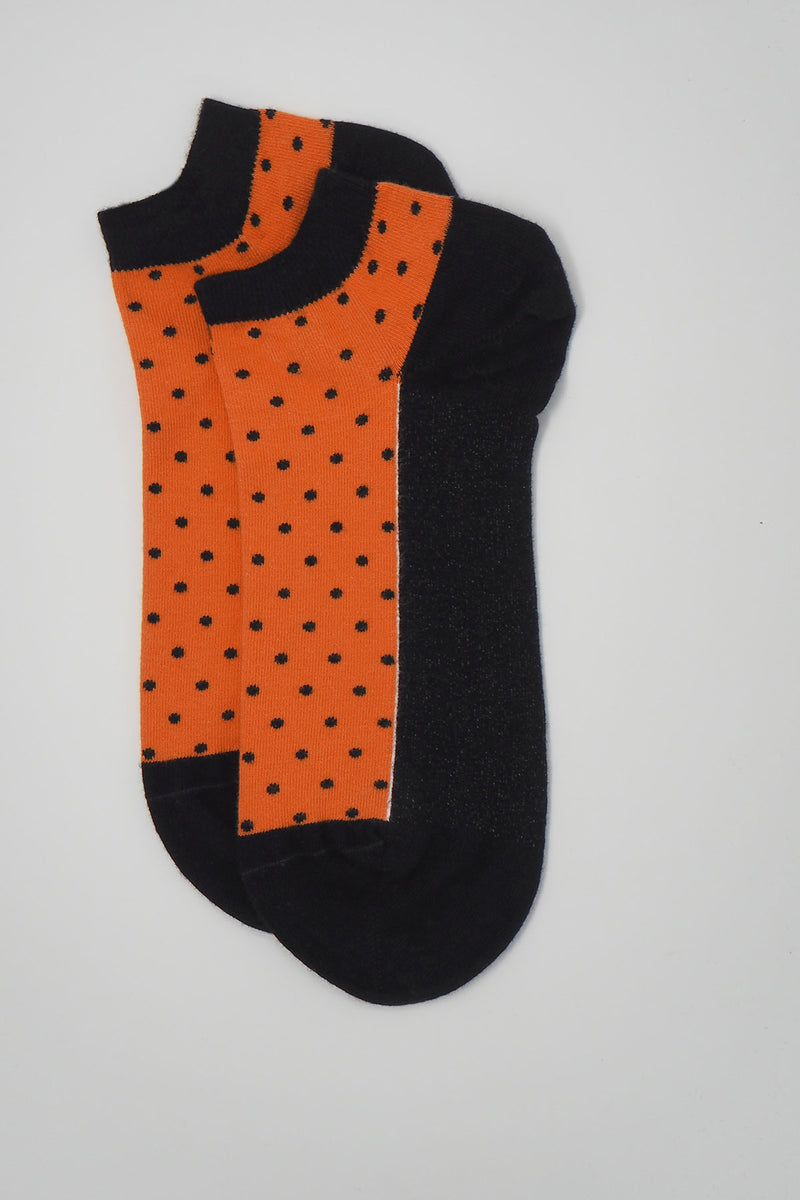 Two Peper Harow orange luxury organic trainer socks laid side by side