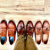 Man wearing boat shoes, tan trousers and maroon Triangle men's luxury socks by Peper Harow