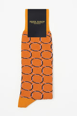 Orange Linked men's luxury patterned socks in Peper Harow packaging