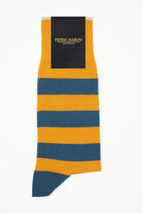 Bright yellow and blue Equilibrium men's striped luxury organic cotton socks by Peper Harow in packaging